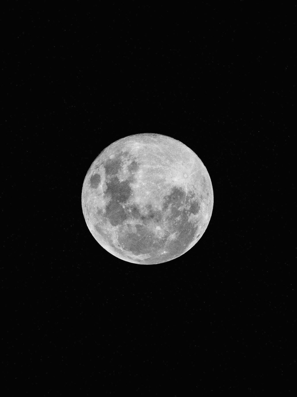 full moon in dark night sky