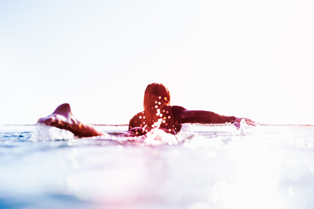 woman in water during daytime