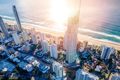 high rise buildings near body of water during daytime