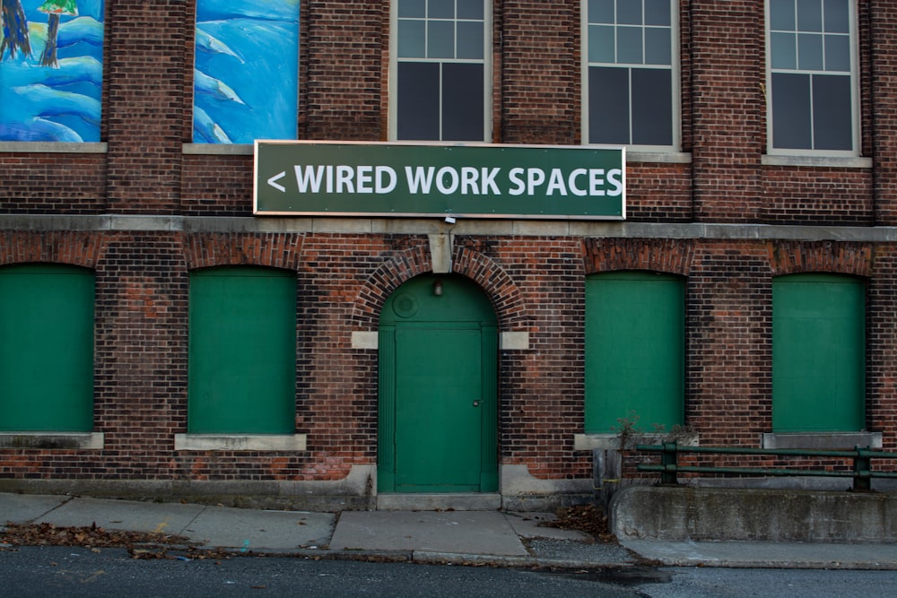 green and white wooden signage