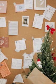 white printer paper on brown wall