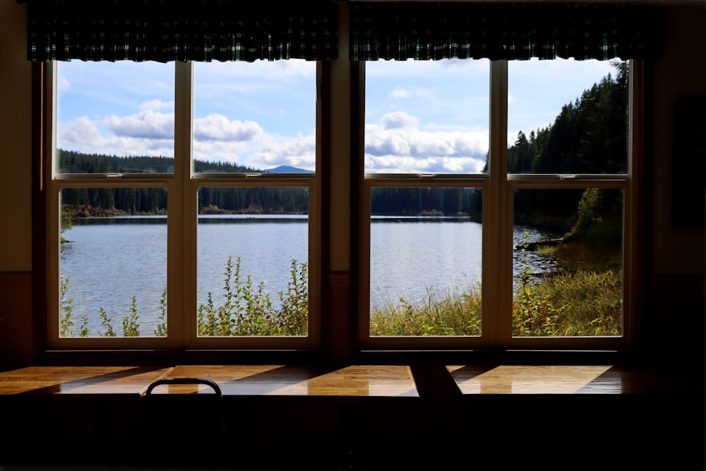 brown wooden framed glass window