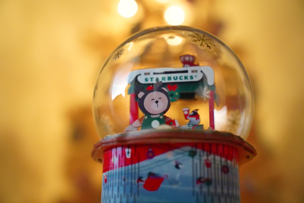 red and white hello kitty snow globe