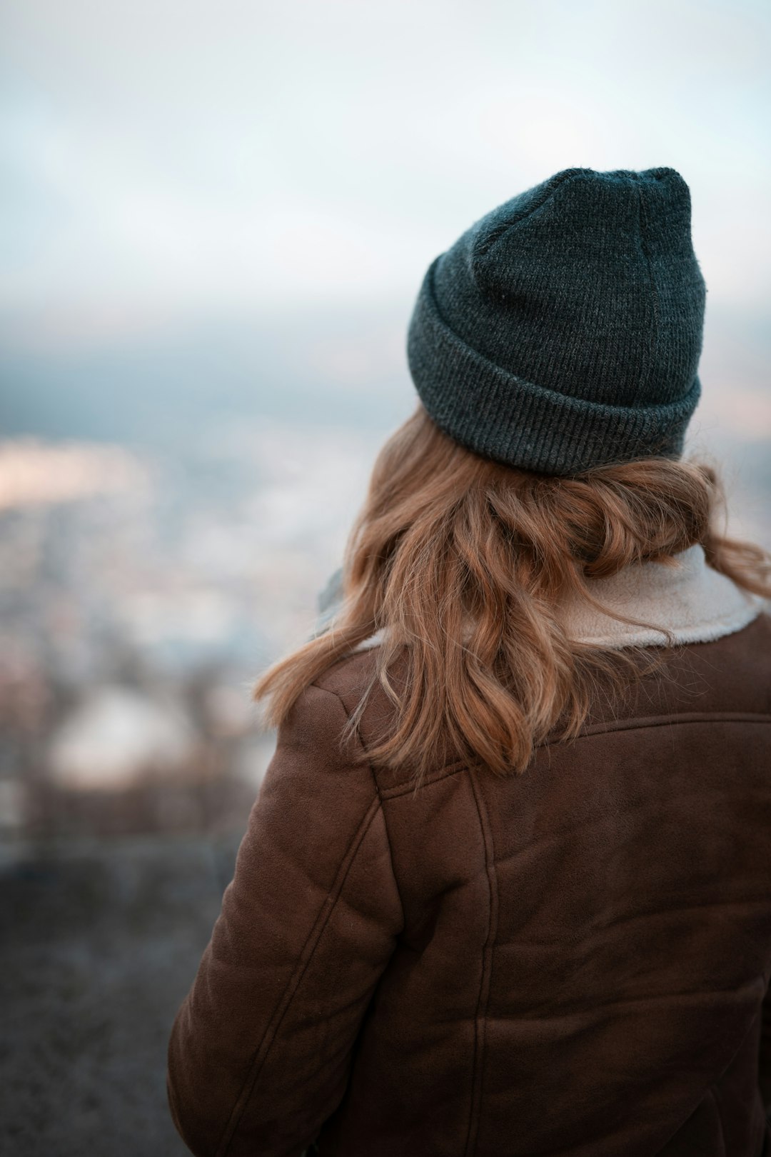 woman in blue knit cap