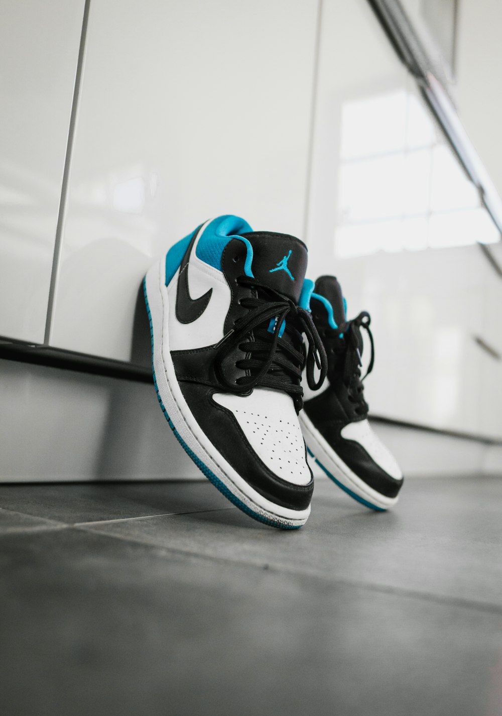 black white and blue nike basketball shoes