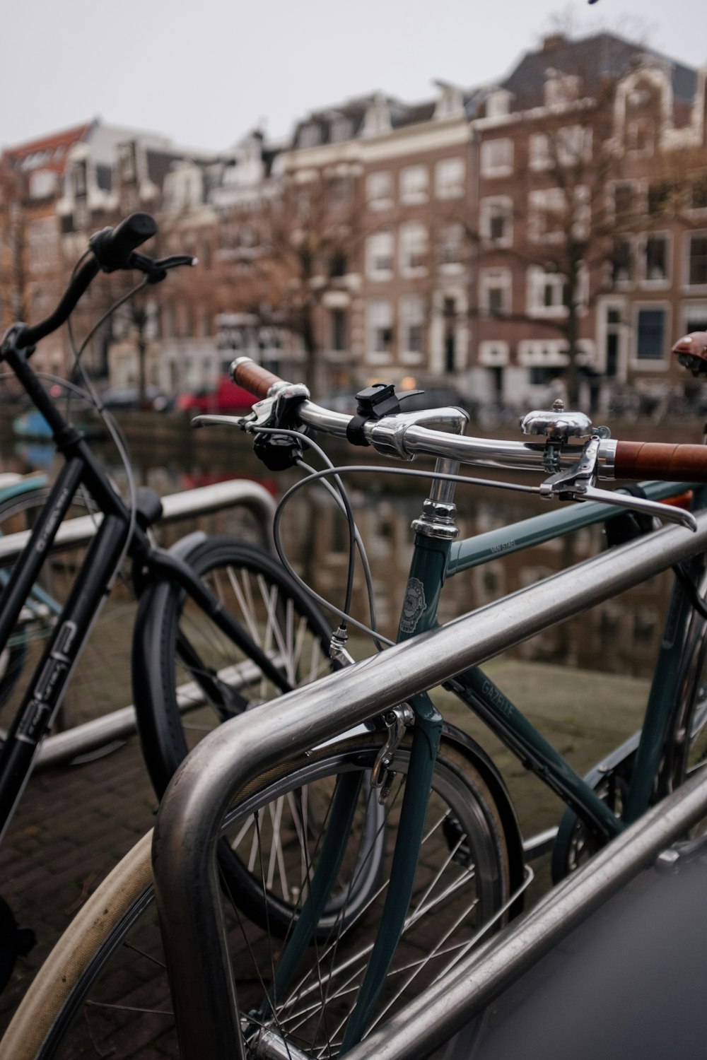 black bicycle on brown brick wall during daytime