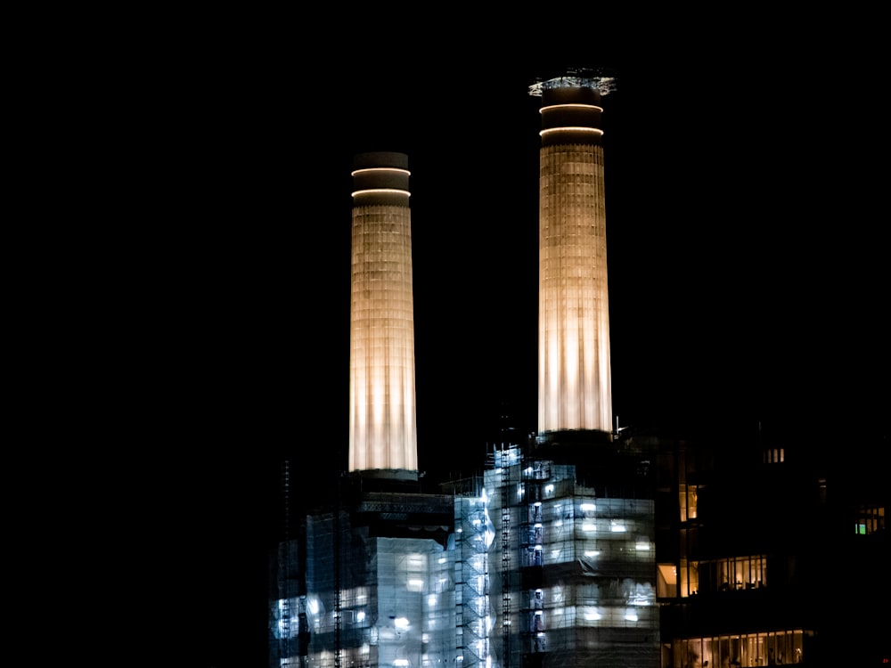 brown and black high rise building during night time