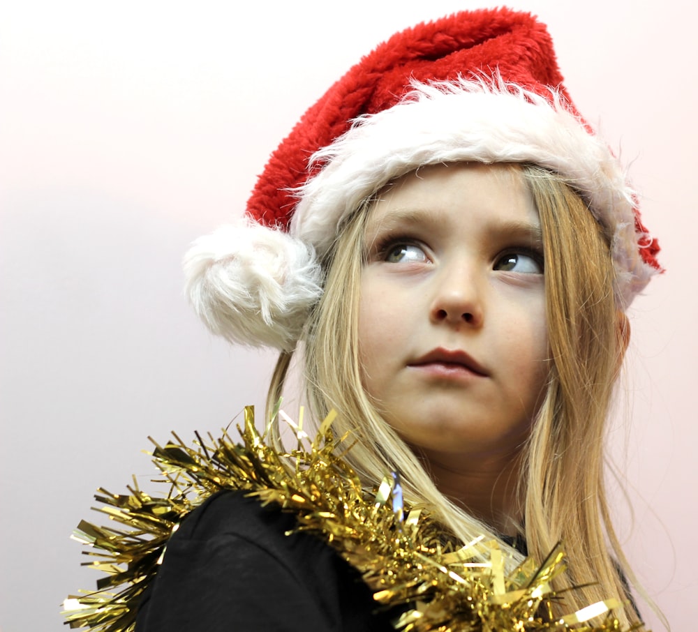 woman in red and white santa hat