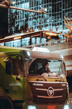 yellow and white bus on road during daytime