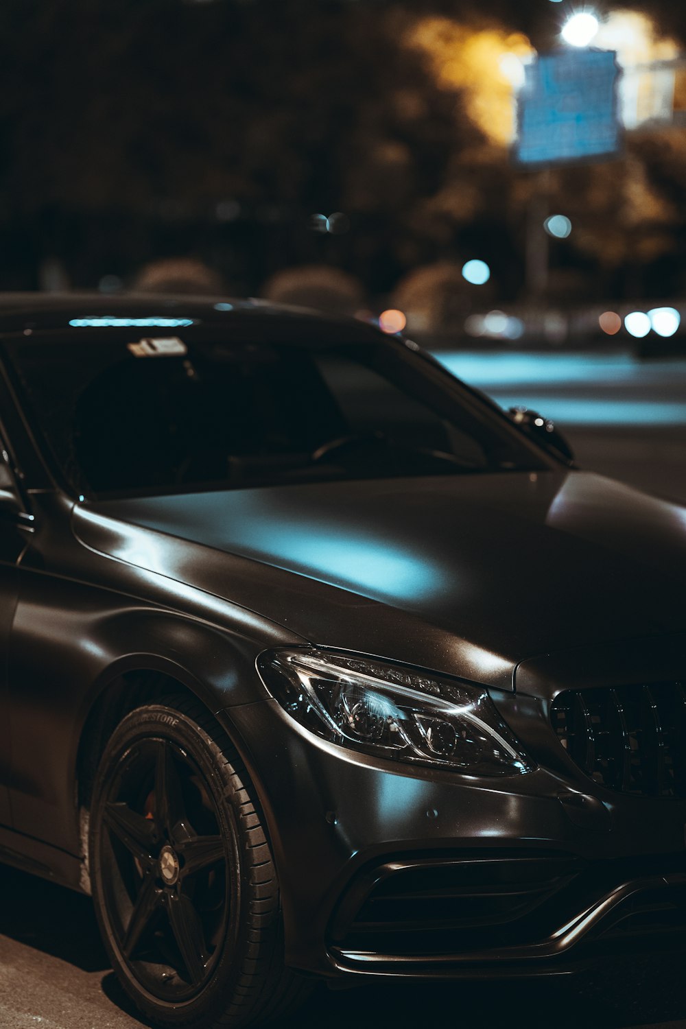 black mercedes benz c class on road during night time