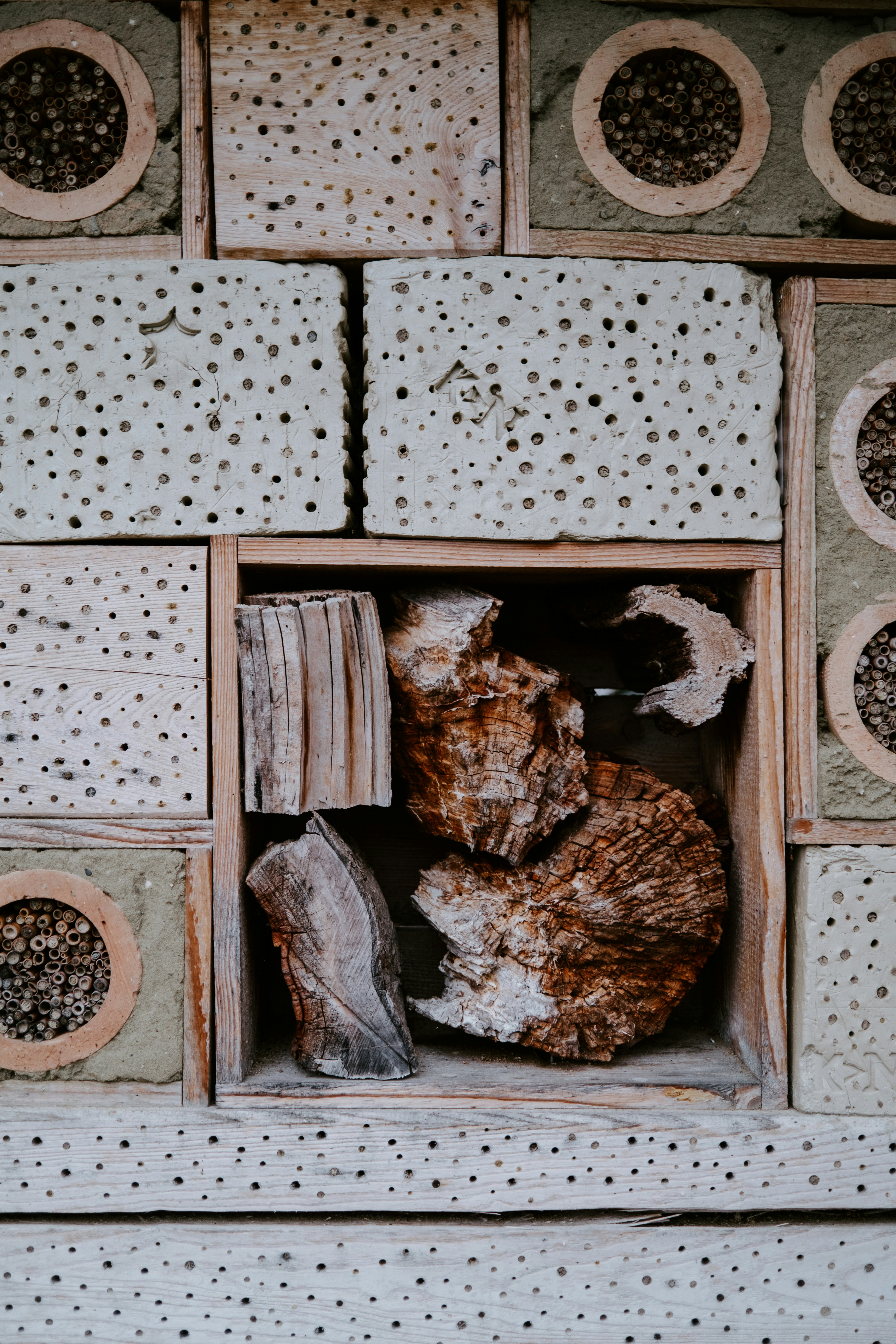 brown wooden frame on white wall