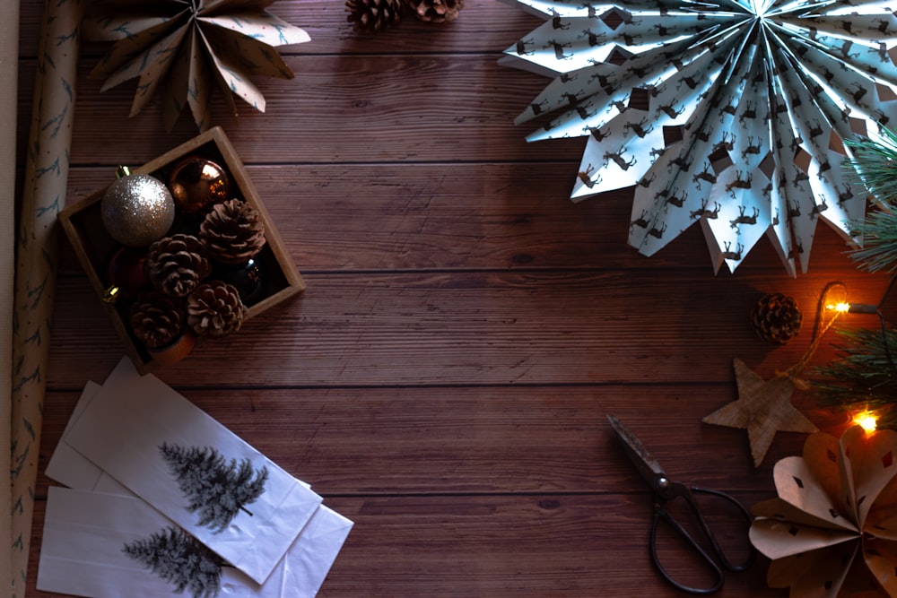 white and blue floral textile on brown wooden floor