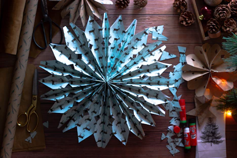 A cozy workspace with crafting materials and a handmade decoration in progress.