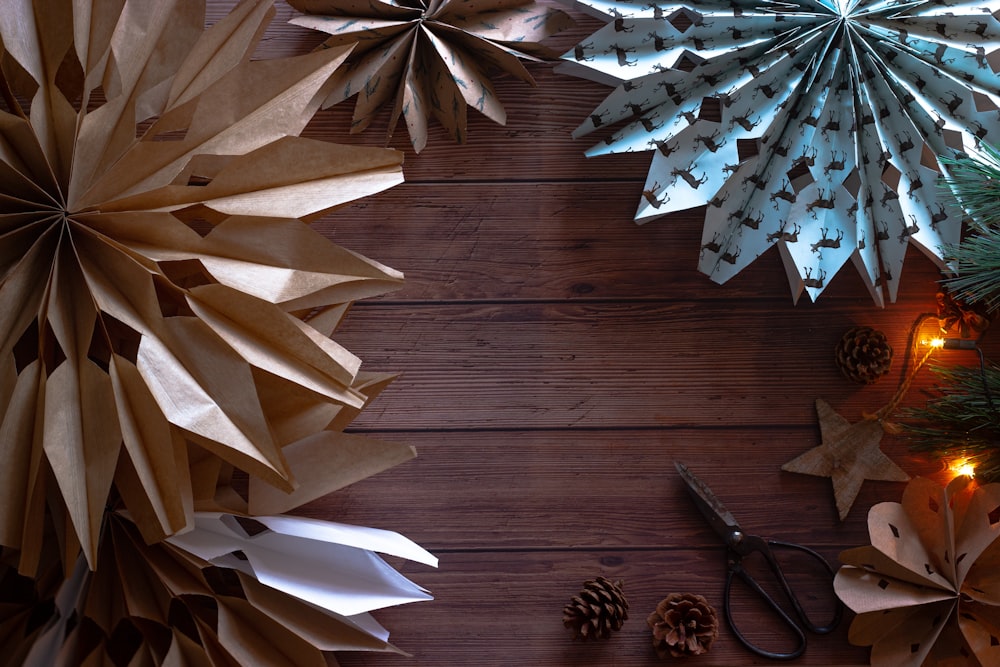 white paper boats on brown wooden floor