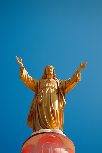 gold statue of a man