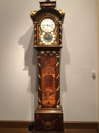 A beautifully engraved wooden clock adorned with intricate designs.