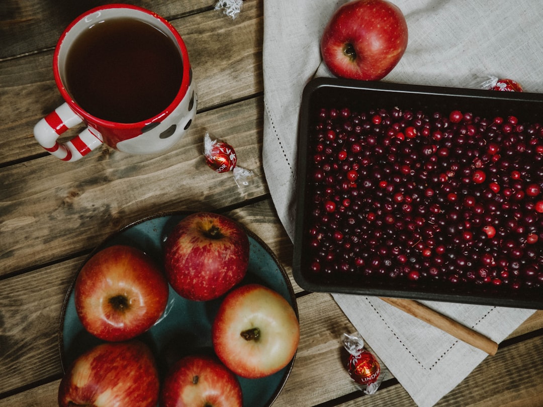 red apple fruit on black tray