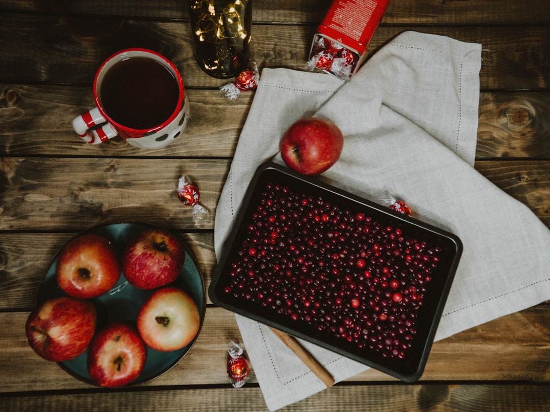 red apple fruit on black tray