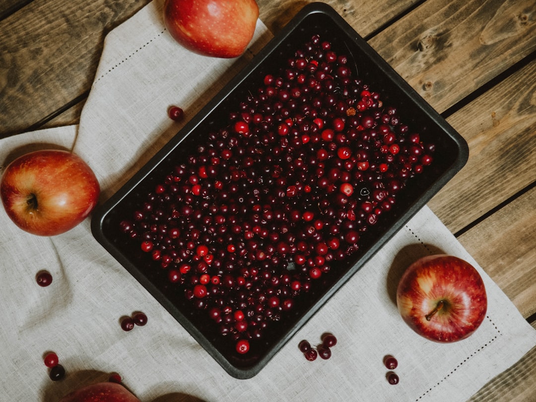 red fruit on black tray