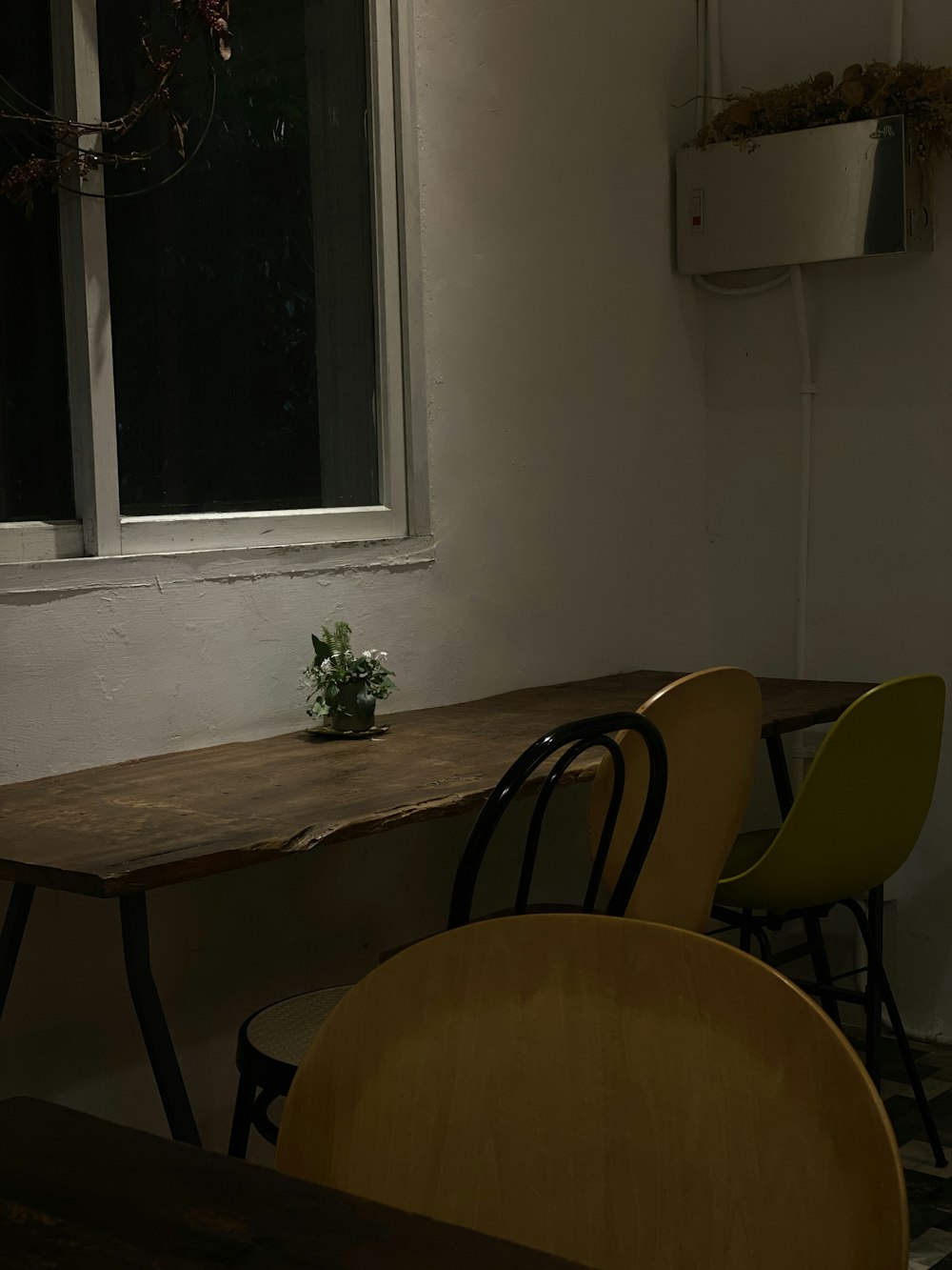 brown wooden table and chairs