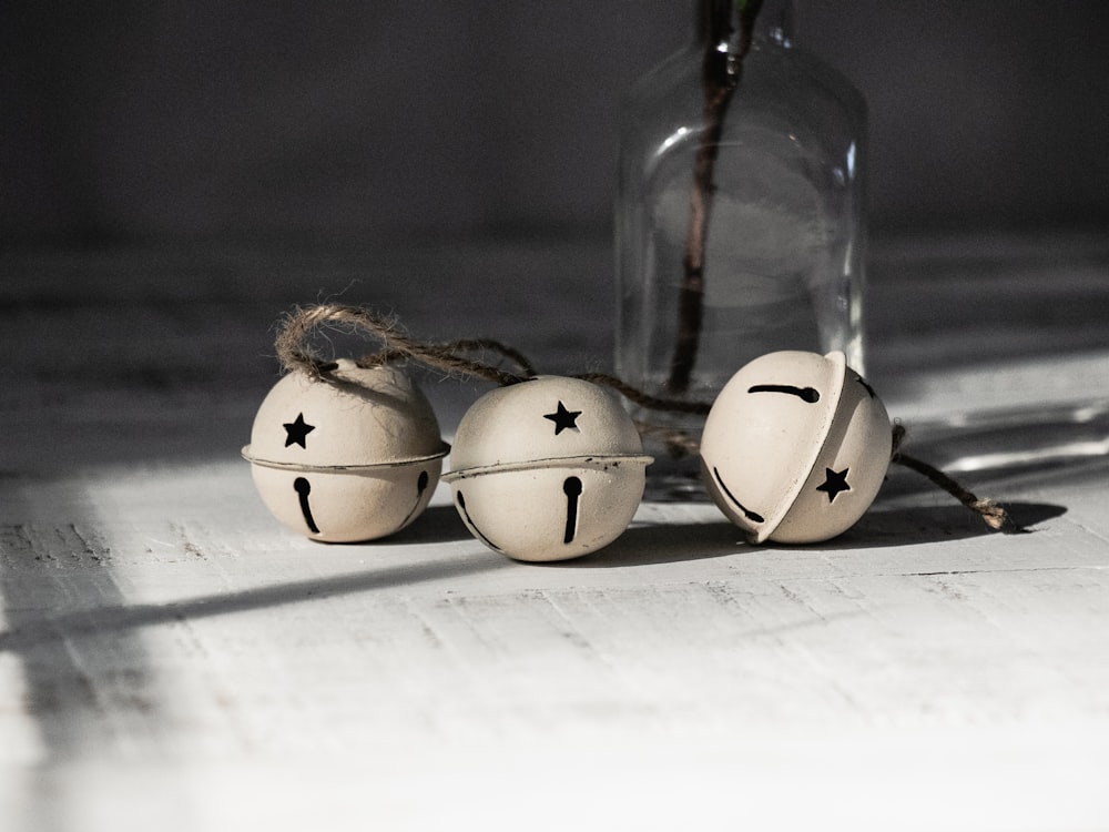 2 white eggs on clear glass jar