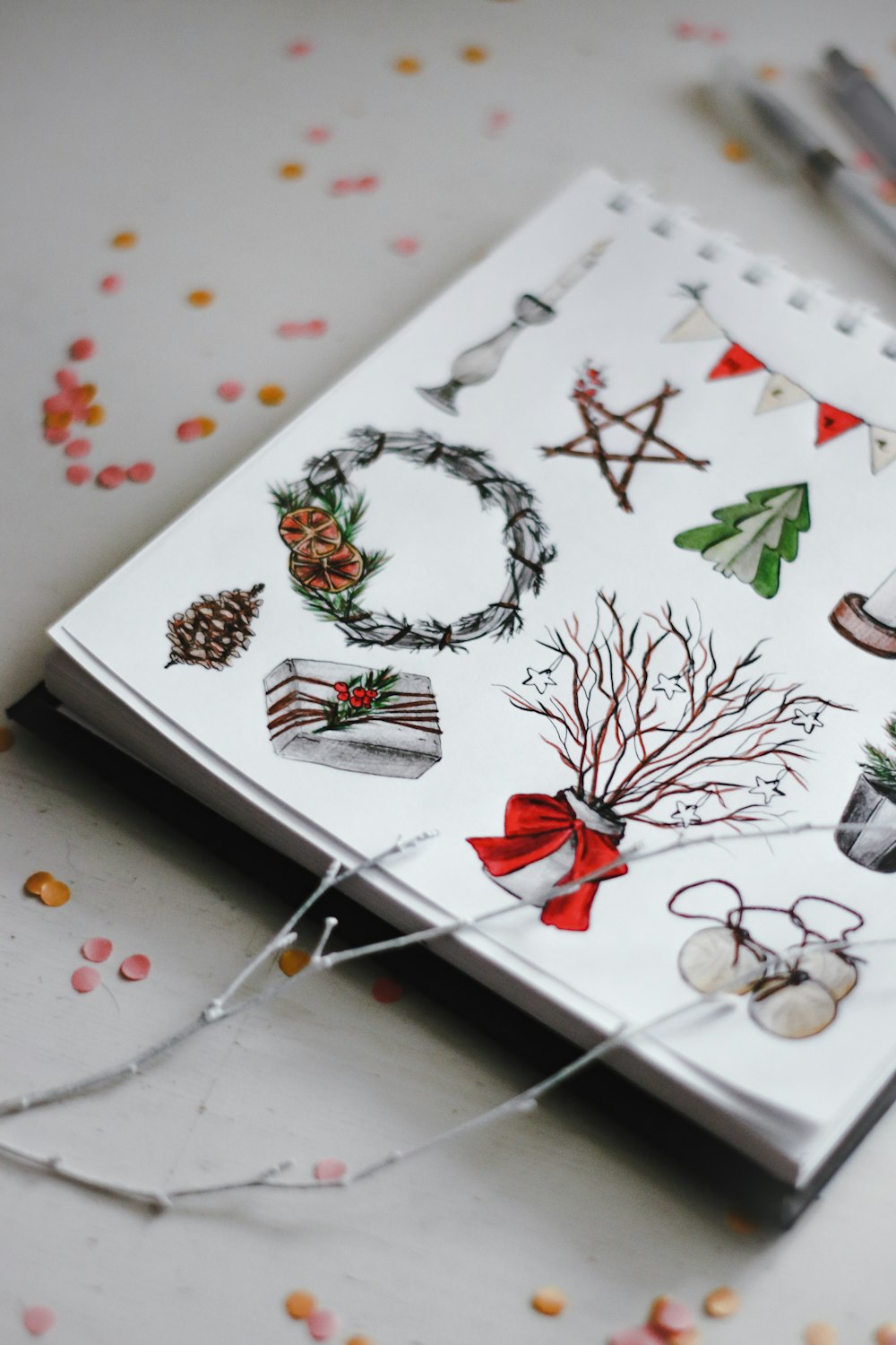 white green and red floral book