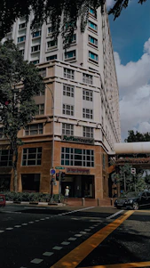 Front view of the hospital building with clear signage and a welcoming entrance.