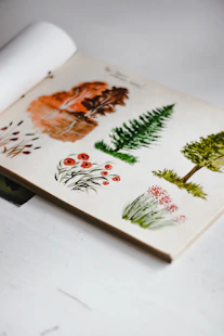white green and red floral book