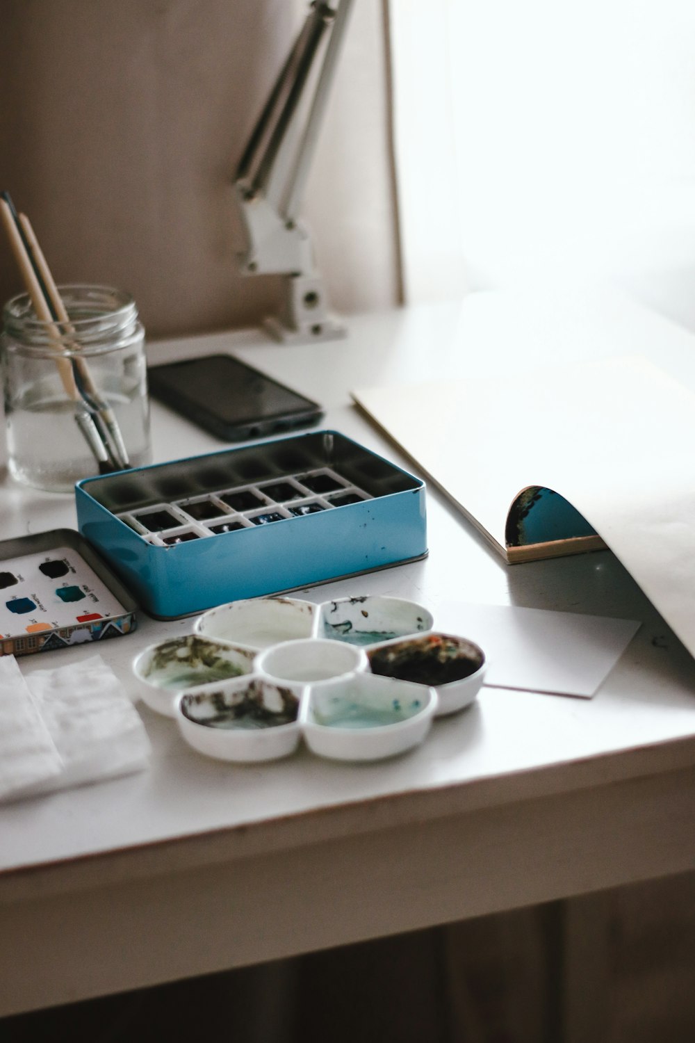 blue and white ceramic bowl on white table