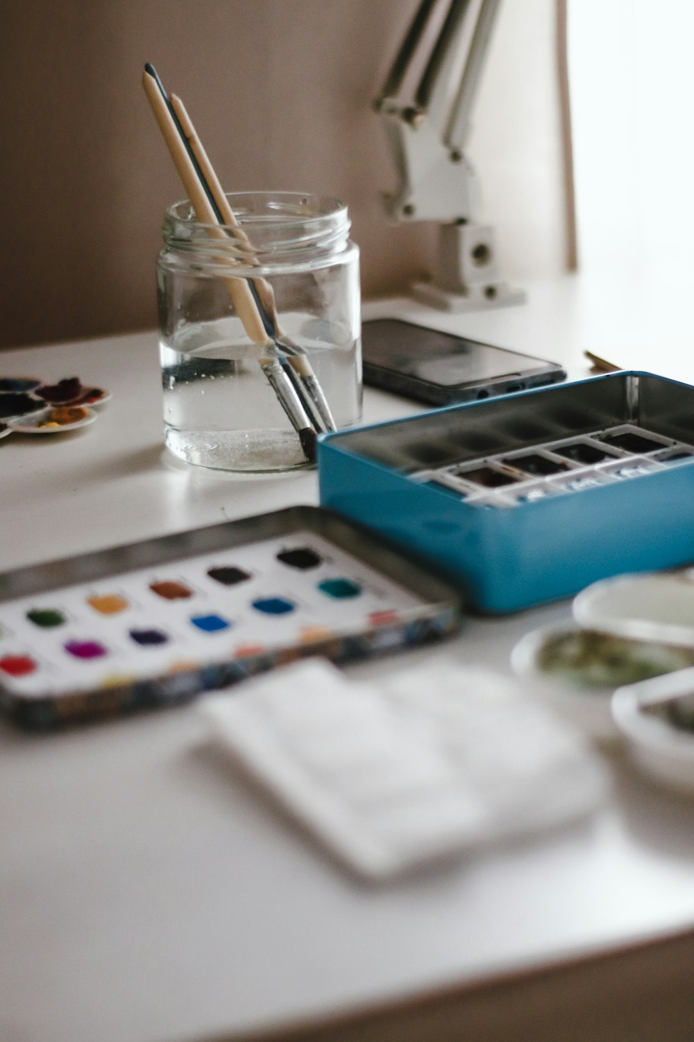 blue and white dice on white table