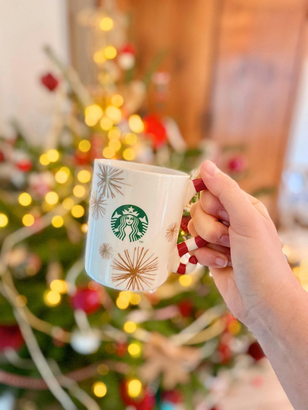 white and green floral ceramic mug