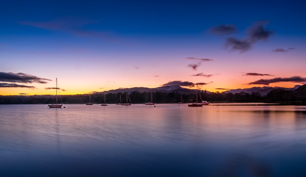 body of water during sunset