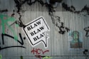 white and black graffiti on wall