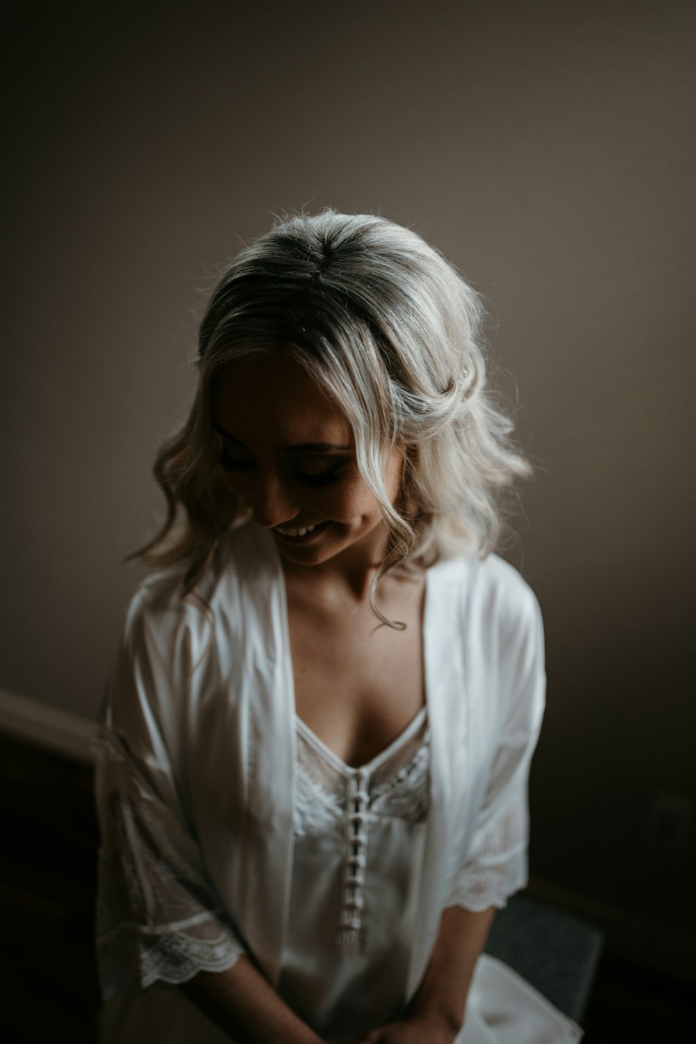 woman in white v neck shirt wearing black sunglasses