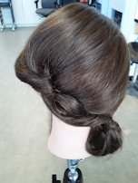 An elegant display of custom-made hairpieces designed for professional use.