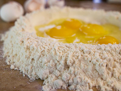 white rice on brown wooden table