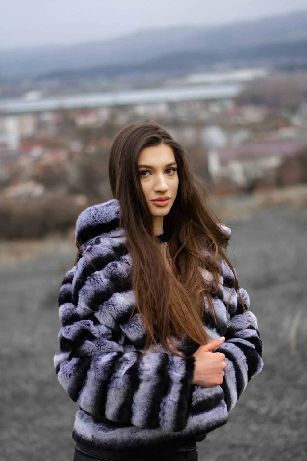 woman in gray and black coat