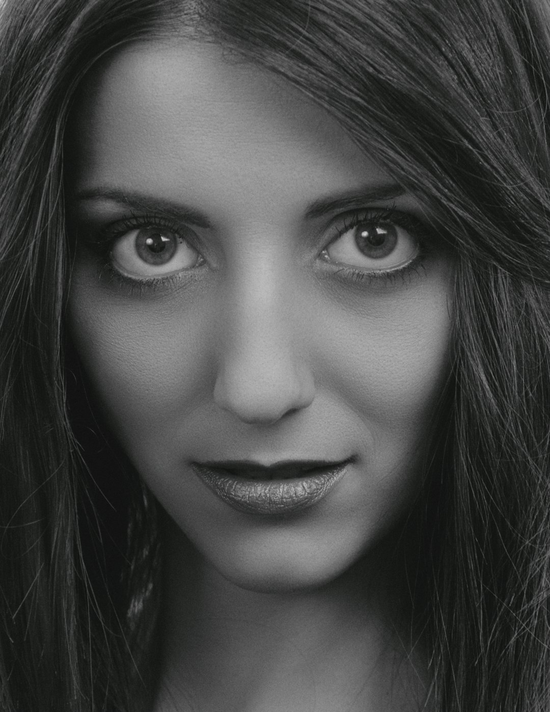 grayscale photo of womans face