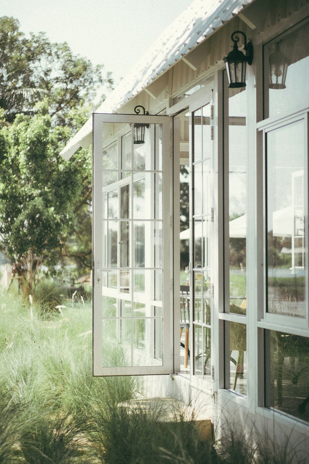 white wooden framed glass window