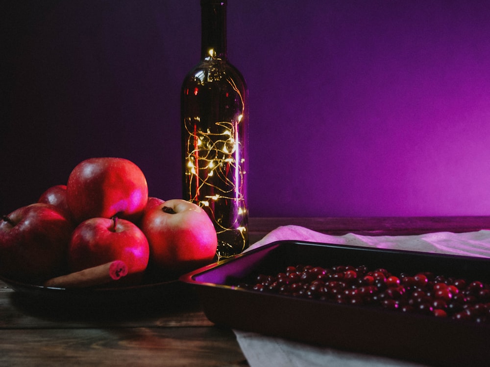 red apples on black tray