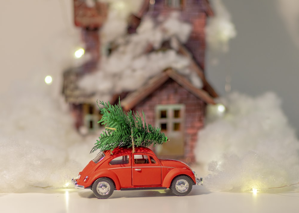 red car with green pine tree on top