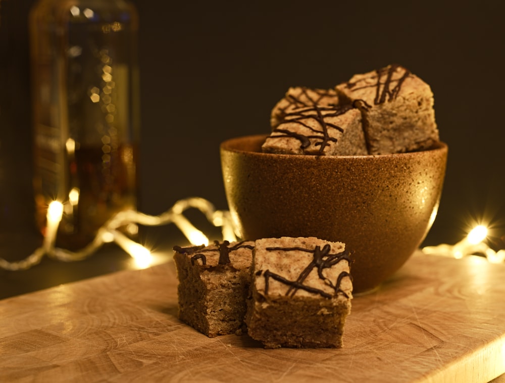 brown ceramic cup on brown wooden table