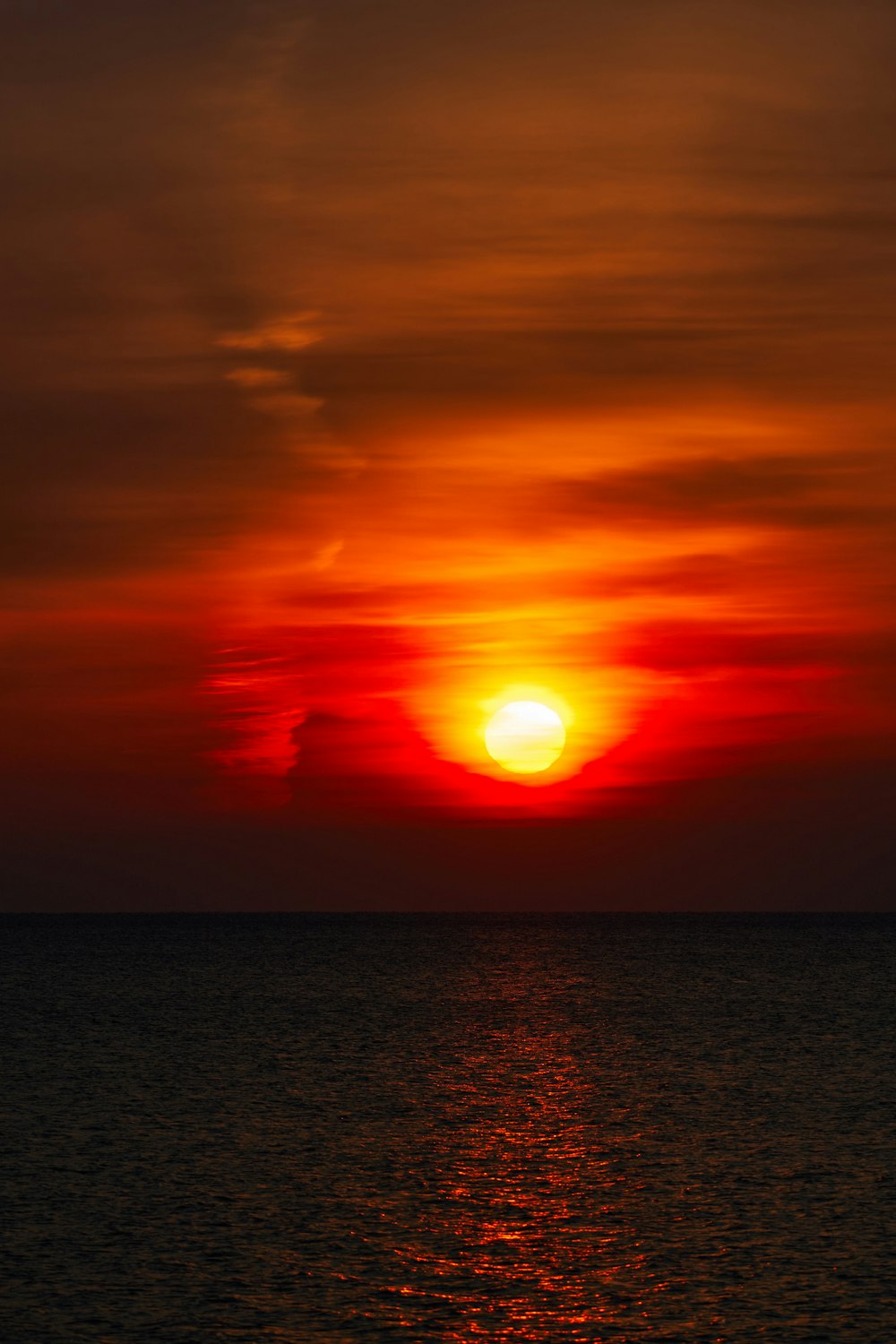 body of water during sunset