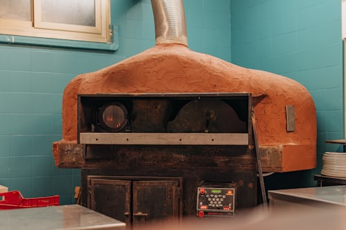 MAM Napoli Rotante 145cm large wood-fired pizza oven in Italian restaurant