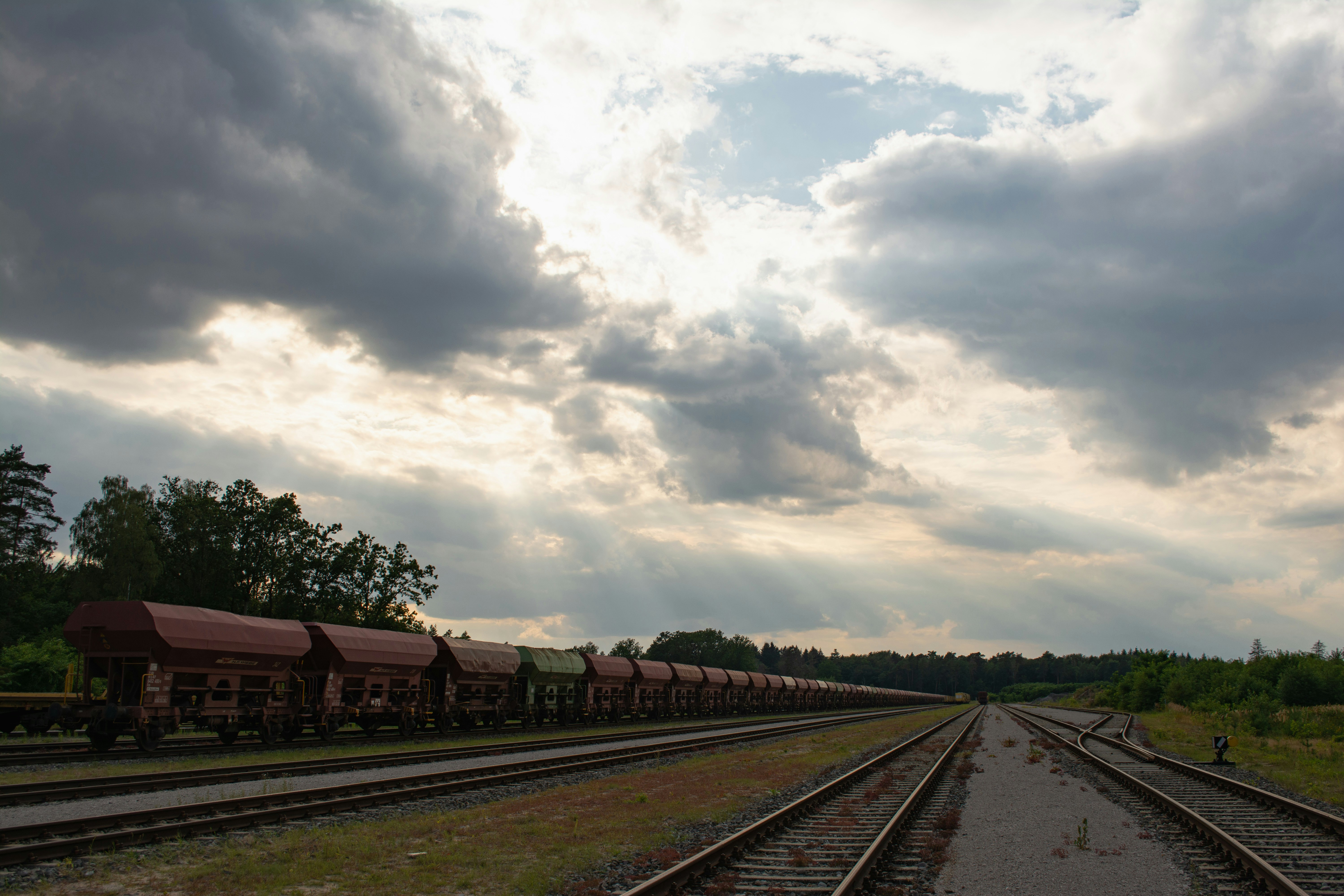A marshaling yard in the middle of nowhere struck by the evening sunrays.
