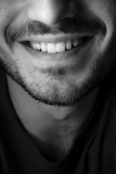 grayscale photo of mans face