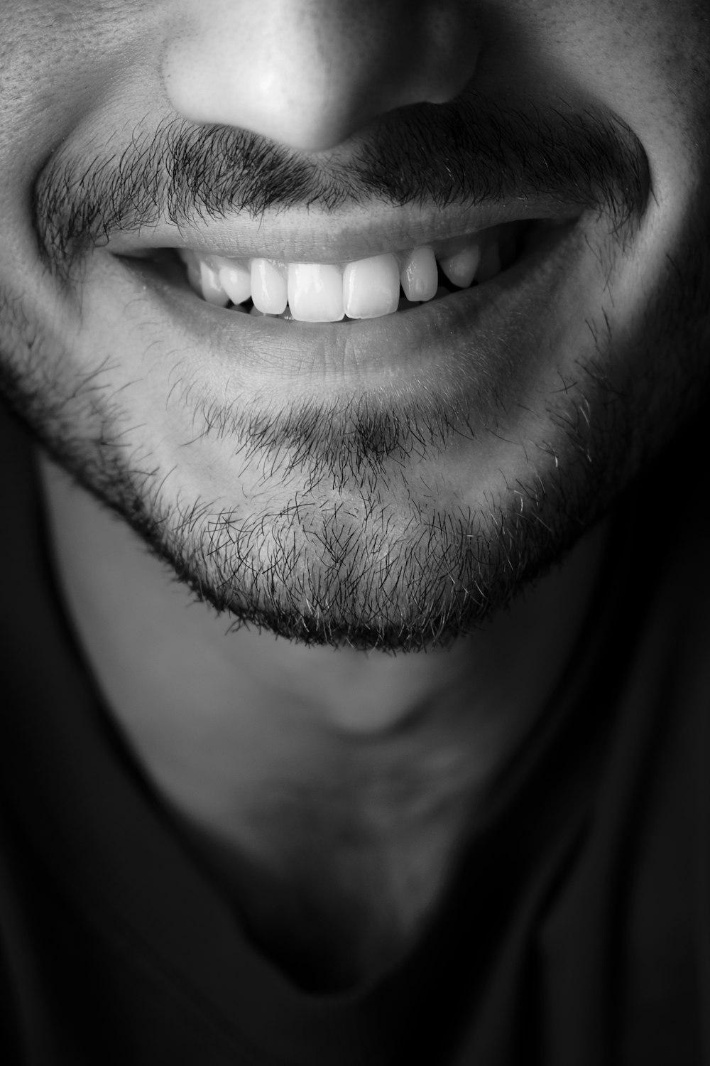 grayscale photo of mans face