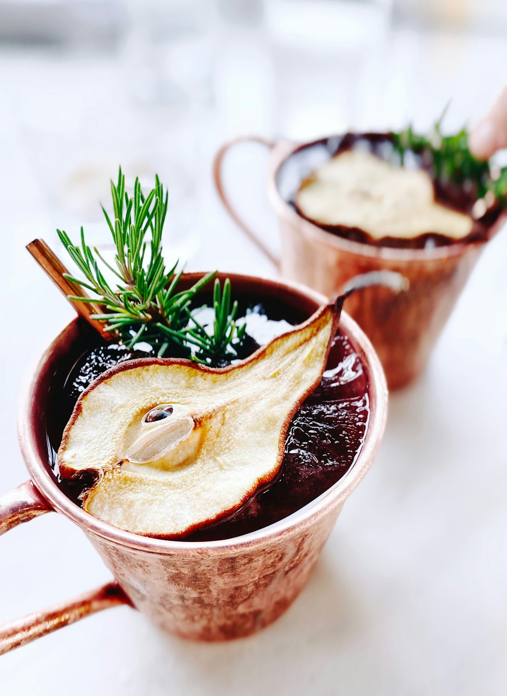 brown liquid in brown ceramic mug