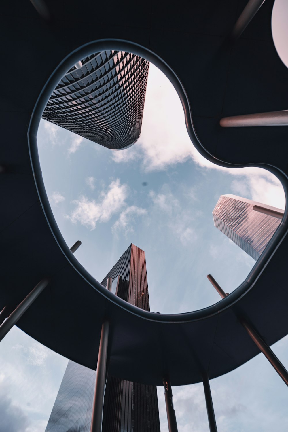 worms eye view of city buildings during daytime