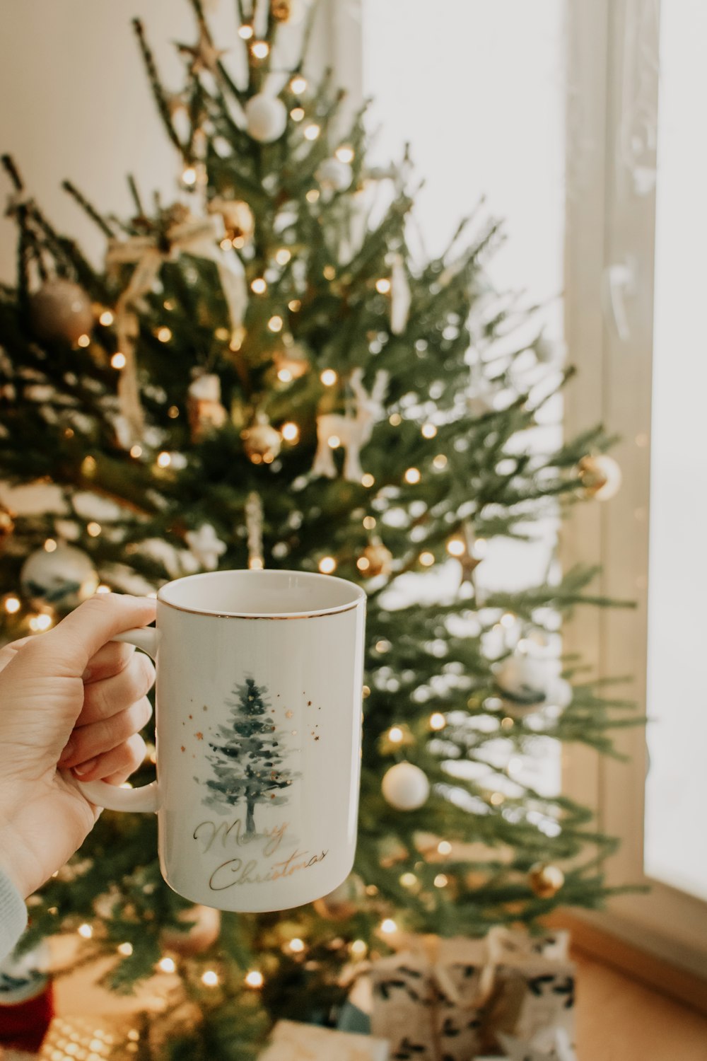 white and green ceramic mug